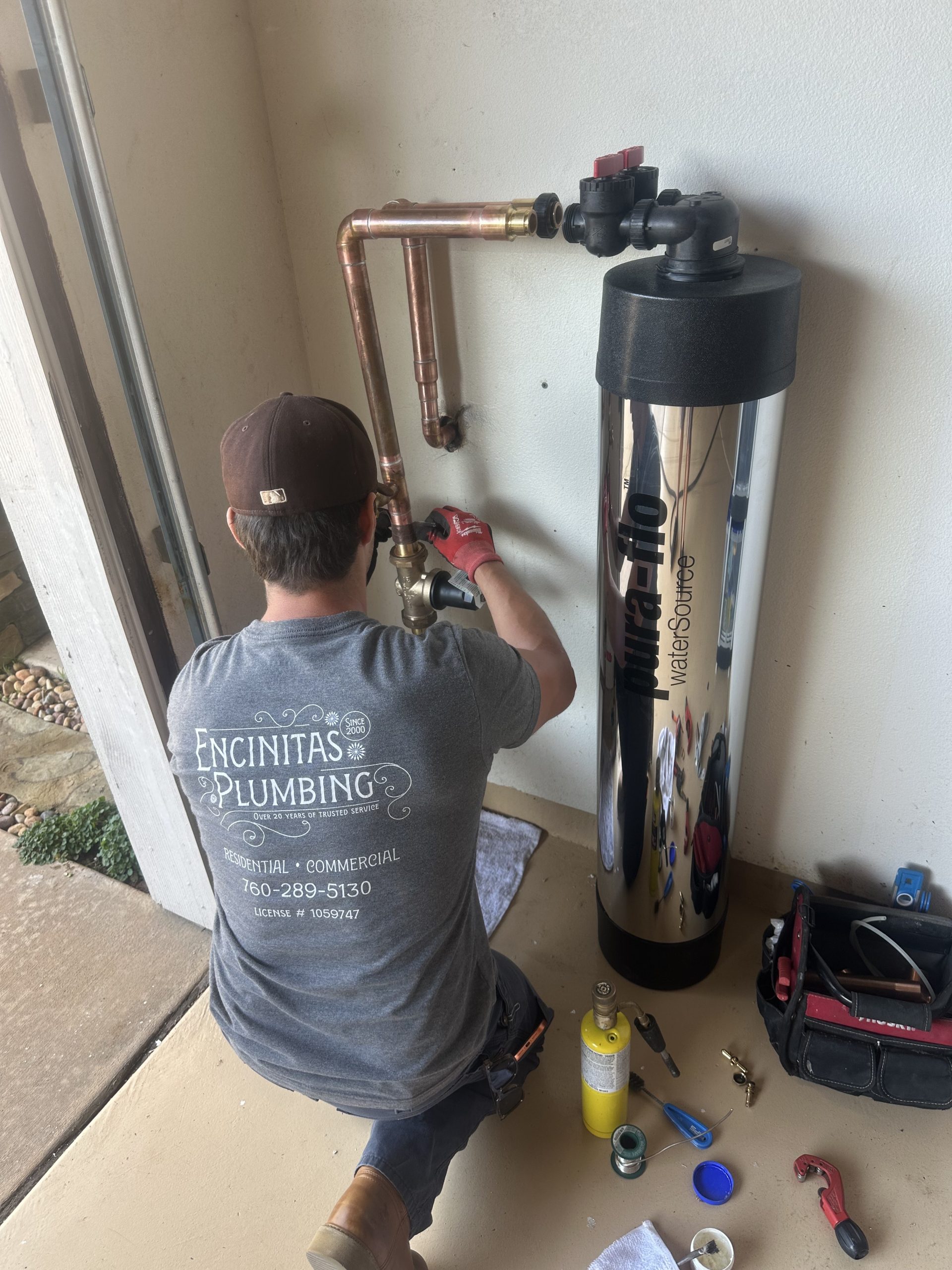 Professional installation of a Pura-Flo DescalePLUS whole-house water conditioning system by Encinitas Plumbing in Carlsbad, CA.